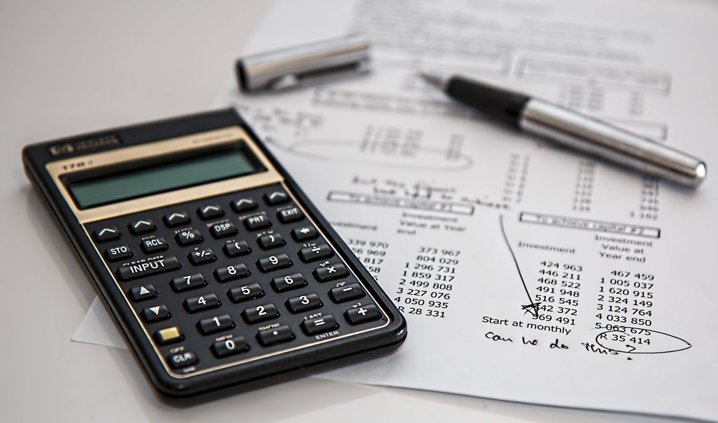 Reviewing costs with a calculator